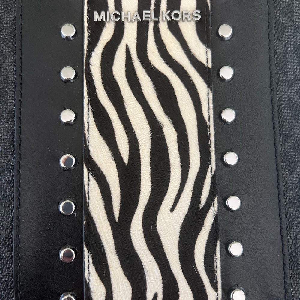Michael Kors Jet Set Large crossbody special edition with animal print detail.